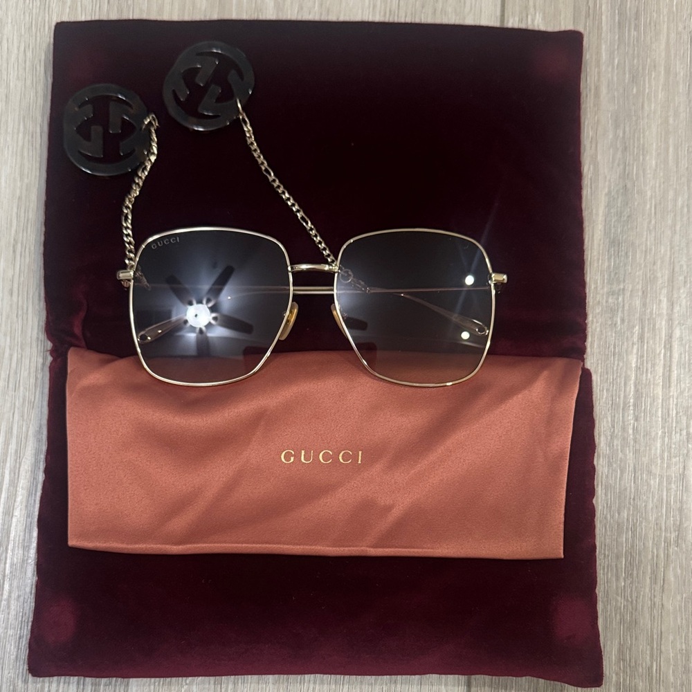 Gucci Women's Sunglasses with Gold Frame and Black Lenses